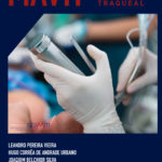 capa do livro contendo profissional de luvas fazendo a intubação